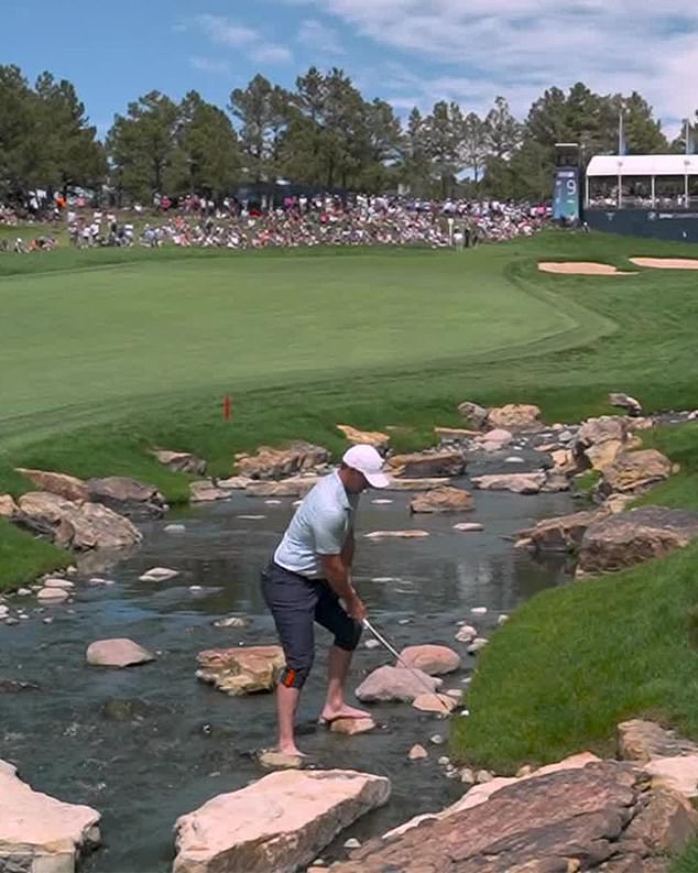 McIlroy had to remove his shoes and socks to play his second swing out of the water in the ninth inning