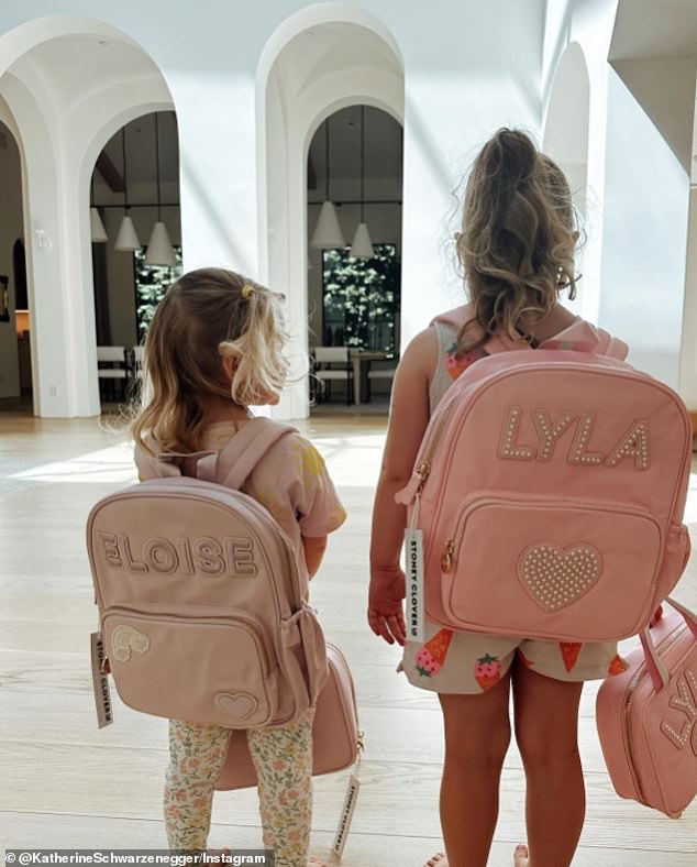 Katherine recently shared photos from her daughters' first day of school, where they both wore backpacks with their names written on them in glitter