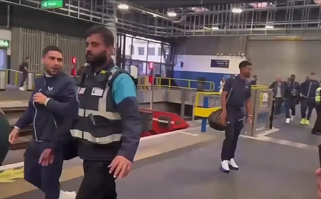 Striker Neal Maupay, left, appeared to bite back at the Everton supporters amid the insults