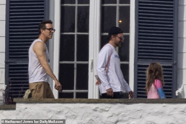 Blake Lively, Ryan Reynolds (left) Bradley Cooper (right) and Kylie Kelce are seen at Taylor Swift's Road Island home on Sunday, August 25.