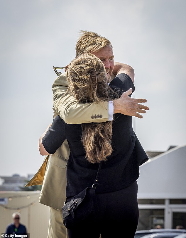 King Willem-Alexander was caught today hugging Princess Annette of the Netherlands