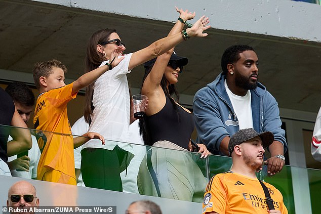 Kim and friends waved to son Saint who walked onto the field with the Real Madrid players