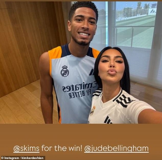 The influencer shared a strange selfie with Jude Bellingham, captioning it cryptically: 'Skims for the win' and tagging the athlete