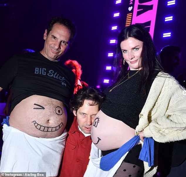 Aisling showed off her baby bump and shared funny videos and photos of a cartoon face painted on her bare stomach after performing a background dance with comedian Seth Herzog