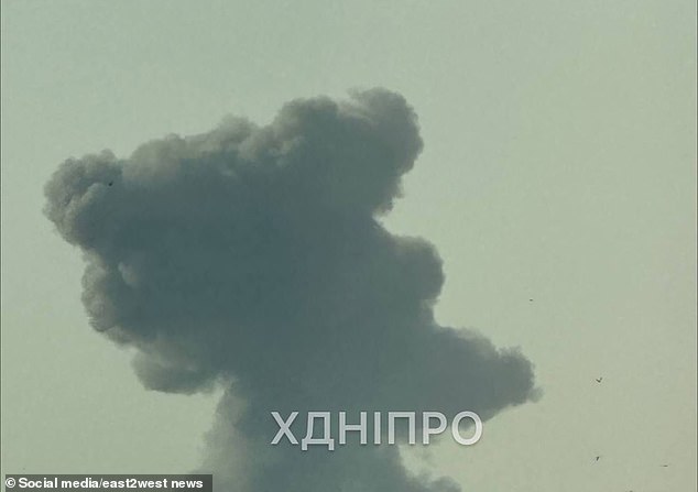 Thundering explosions were reported in Kiev, Kharkiv, Dnipro, Zaporizhzhia. Pictured: Smoke is seen from an attack on Dnipro