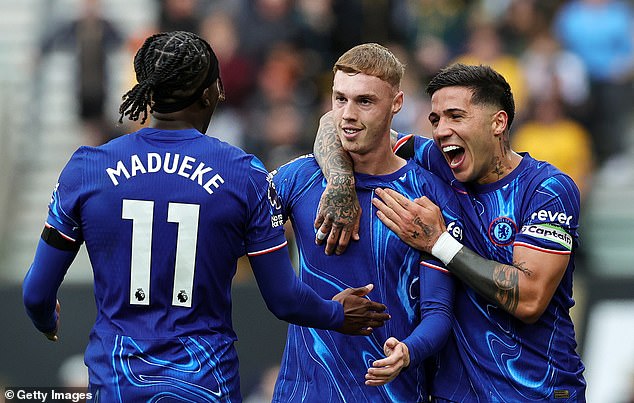 Palmer (centre) would also join an exclusive list of players who have assisted every goal for a team-mate's hat-trick in the Premier League, after assisting Madueke for his three goals