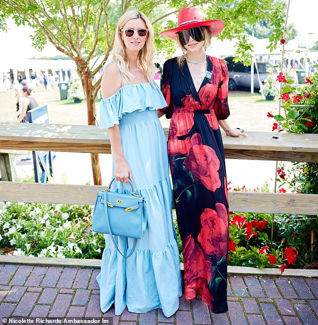 The women went outside as they prepared for a day of horse racing