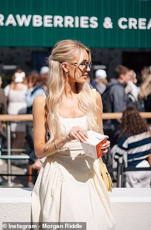 The fashion guru, pictured in a Peppermayo dress, regularly follows her husband on the ATP Tour