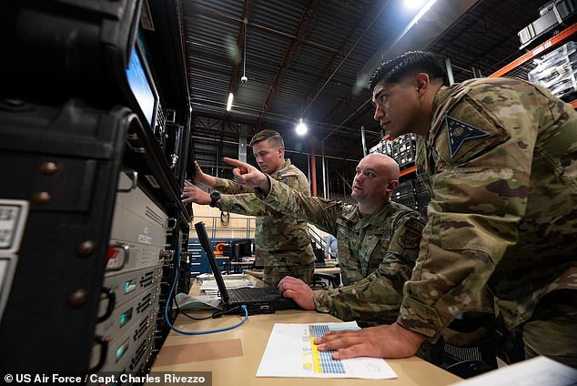 Space Force and Air Force personnel operate RMT equipment during a test of the new system. The devices are designed to be deployed in large numbers and operated remotely.