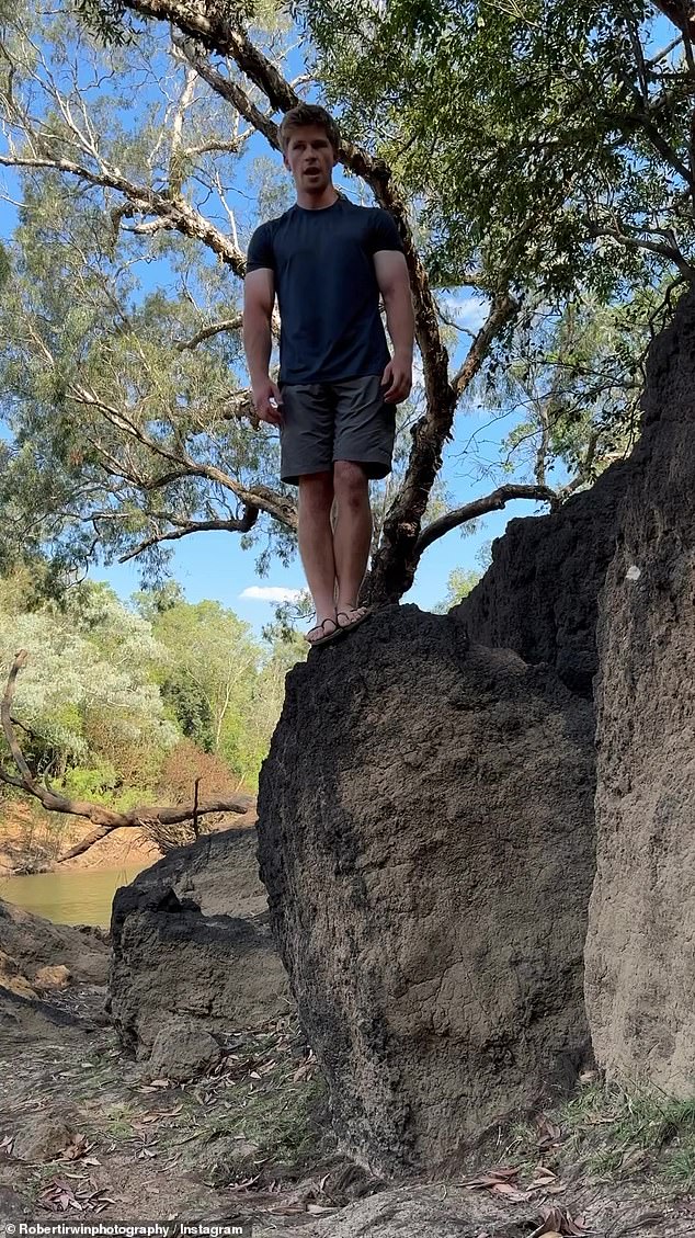 Eagle-eyed fans were quick to comment on Robert's impressive muscular arms as he stood on a large rock