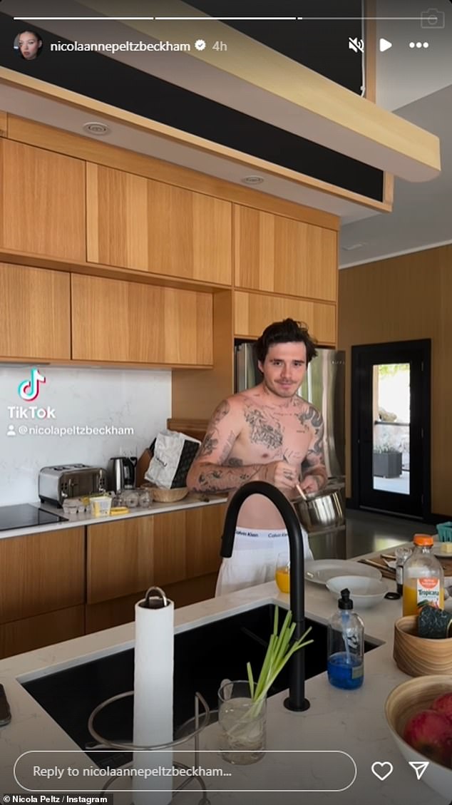 She also shared a topless clip of Brooklyn preparing breakfast at their posh accommodation