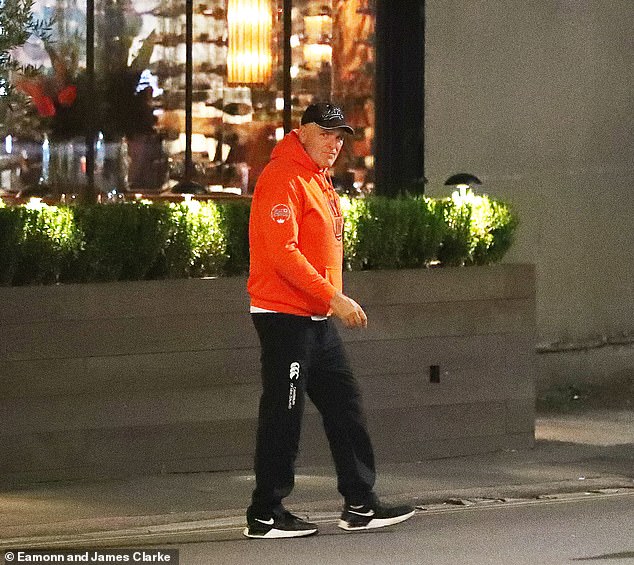 John Fury looked casual in a tracksuit while dining with his sons