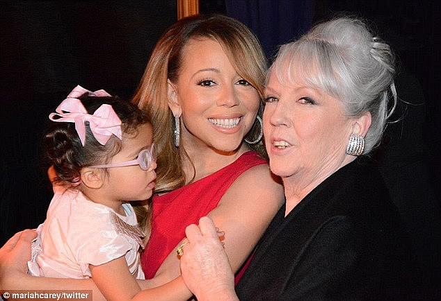 Carey with daughter Monroe and her mother Patricia