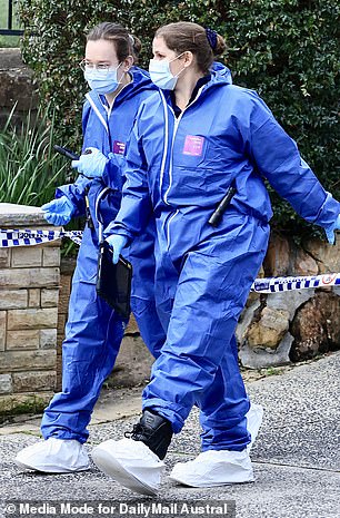 Forensic staff leave the house on Menzies Road after the tragic discovery of the bodies of Jennifer and Ella Carrig