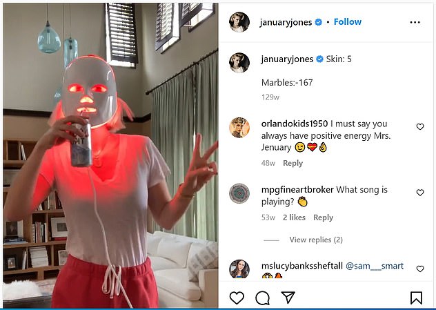 American actress January Jones with her LED mask. Celebrities praise the devices as a way to keep their skin looking young