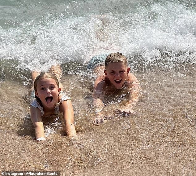 The A Place In The Sun presenter and her son Rocco, 9, (right) and daughter Tahlia, 6, (left) made the most of their sunny holiday