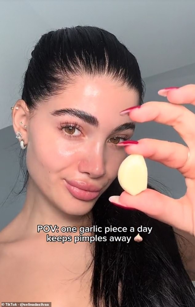 Another TikToker, who goes by the username @selinadasilvaa, claimed in a video: 'One garlic a day keeps pimples away'