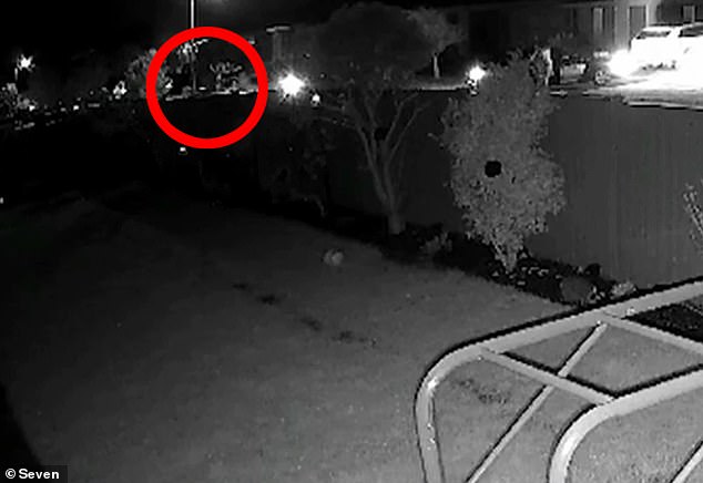 The shooting was captured on CCTV (pictured) before the gunmen fled the scene in the white station wagon