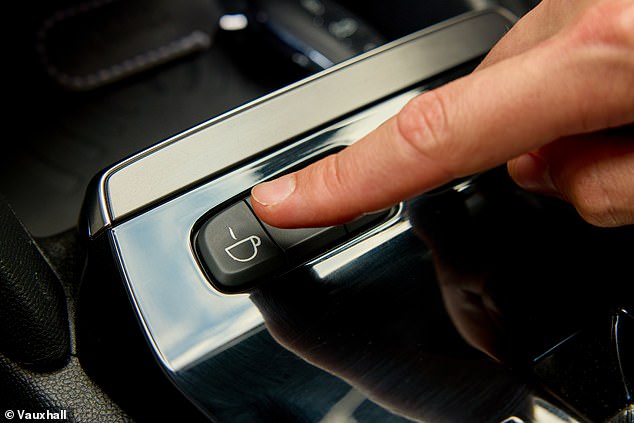 Just like you press a switch in a normal car to open the trunk, you can operate the car's coffee station with a single press of a button in the center console