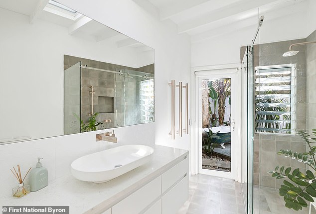 The couple carried out a series of major renovations to the property, including adding an extension and a granny flat. Pictured: The ensuite in the master bedroom