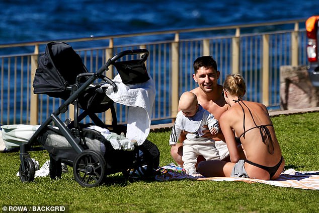 The 26-year-old Roosters player went shirtless during the outing, showing off his muscular physique as he enjoyed the sunny day.