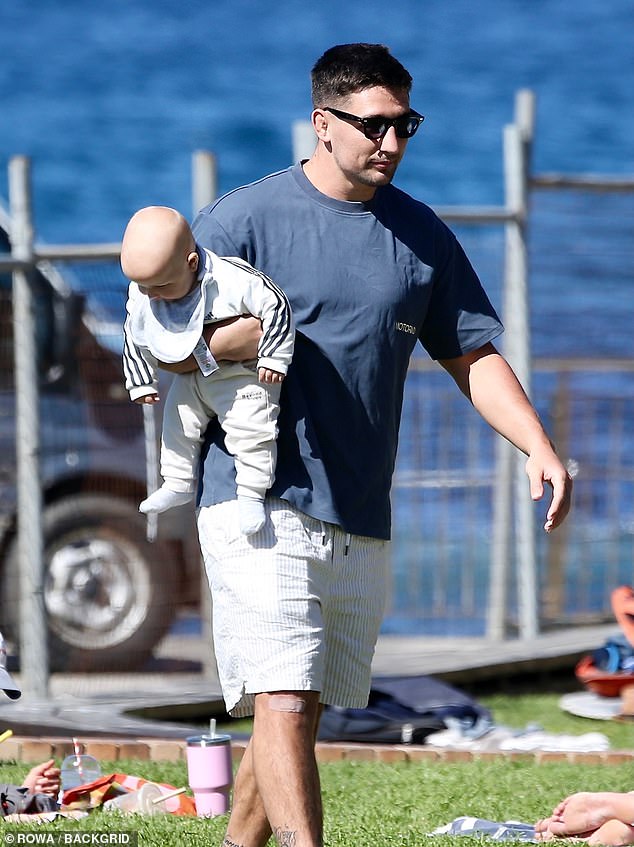 Later in the day, Radley wore a navy T-shirt and white shorts