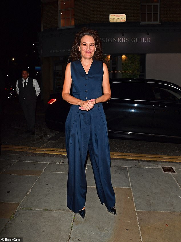 Director Coralie Fargeat was chic in a blue cardigan and pants, ready for her in-conversation event