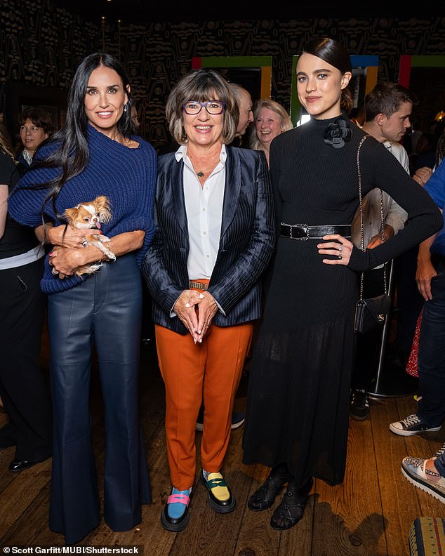 Demi brought her beloved Chihuahua named Pilaf to the event (pictured with CNN anchor Christiane Amanpour)