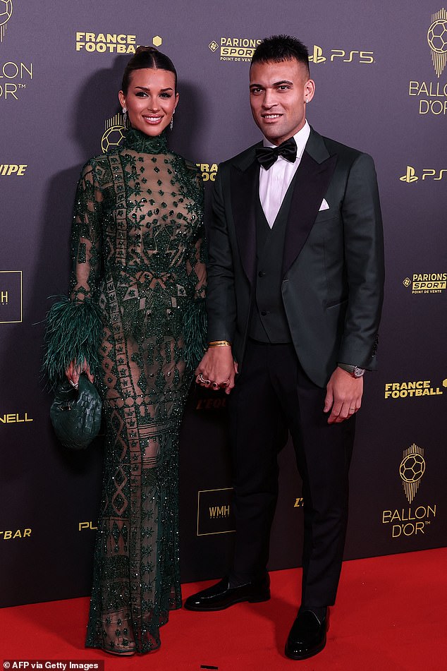 Inter Milan's Argentine forward Lautaro Martinez (R) and his partner Agustina Gandolfo pose before the 2023 Ballon d'Or award ceremony