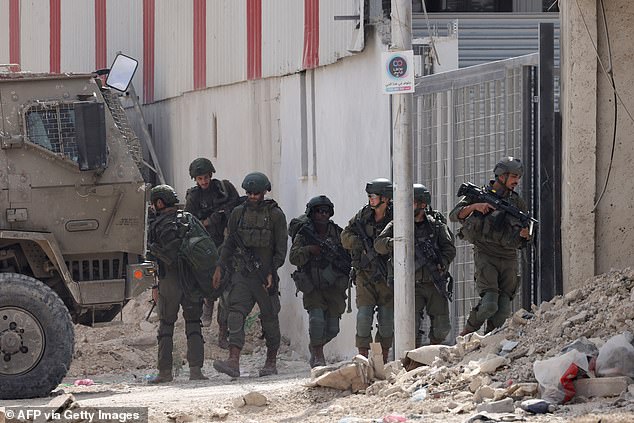 Israeli soldiers operate during a raid on the Nur Shams camp for Palestinian refugees near the town of Tulkarem in the Israeli-occupied West Bank