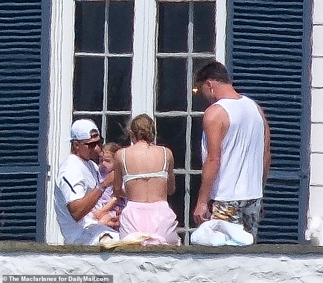 Swift has been holed up in her mansion with friends including Blake Lively and Channing Tatum — seen cooing at Patrick Mahomes' three-year-old daughter Sterling