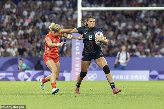 Maher holds off Great Britain Women's National Team's Emma Uren #7 during the Paris Games