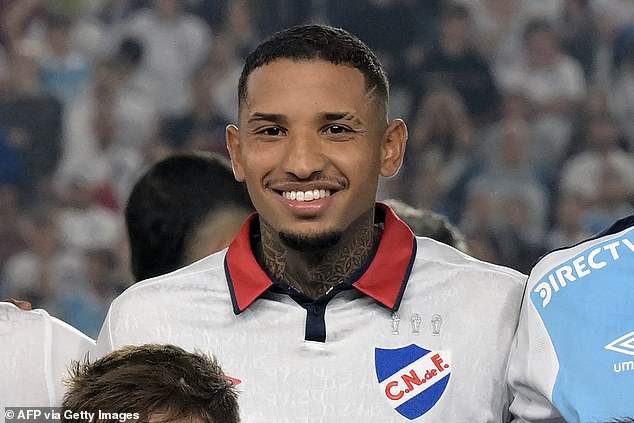 Nacional defender Juan Manuel Izquierdo poses for the team photo in March