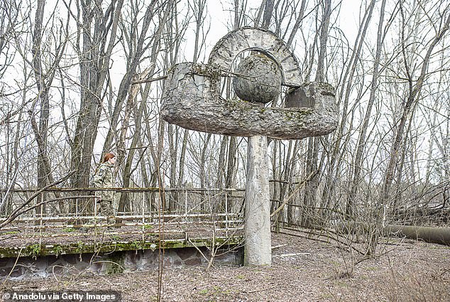 New tests have found that Acid Canyon, a popular hiking trail near the birthplace of the atomic bomb in Los Alamos, New Mexico, is still radioactive at levels comparable to those seen in the Soviet Union's Chernobyl nuclear disaster. (Above: Abandoned signs near Chernobyl)