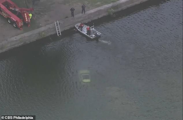 Both the man and woman were able to escape from the car before it sank, but they faced a very embarrassing trek back to dry land.