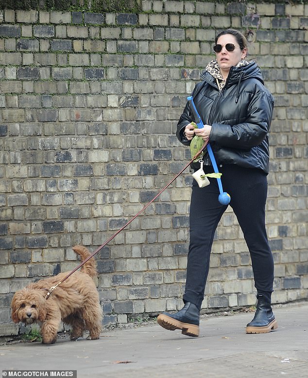 When considering whether to get a dog, the researchers encourage owners to instead consider other factors such as anticipated health problems, breed size suitability, behavioral and grooming needs for their lifestyle, and likely temperament to decide on their chosen breed. Pictured: Kelly Brook and her beloved cavapoo, Teddy