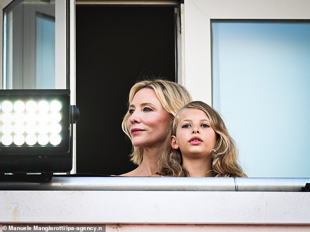 Cate and Edith were spotted watching the red carpet from a balcony, snuggling up and enjoying the spectacular view