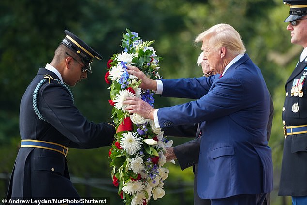 Donald Trump visits Arlington Cemetery to pay tribute to the 13 soldiers who died during the evacuation from Afghanistan.