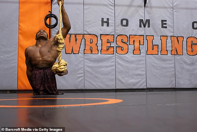 Clark's wrestling career continued to flourish while attending Kent State University, where he also excelled in wheelchair racing and won his second high school state championship