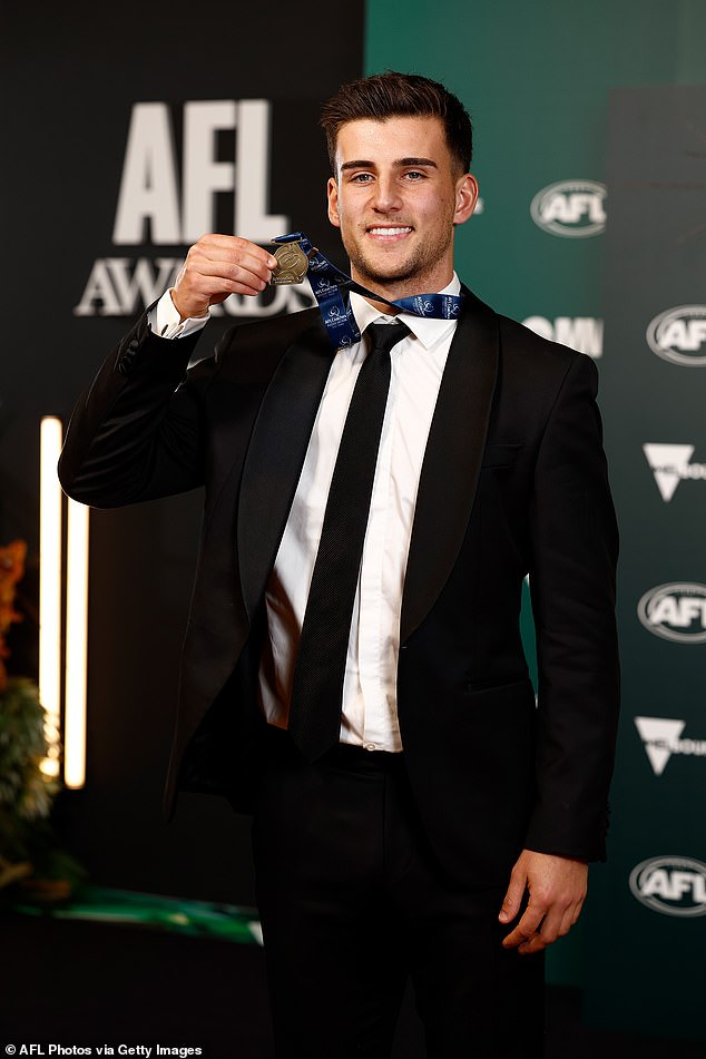 Nick had plenty of reason to be happy at the big event as he won the AFL Coaches Association Champion Player of the Year award