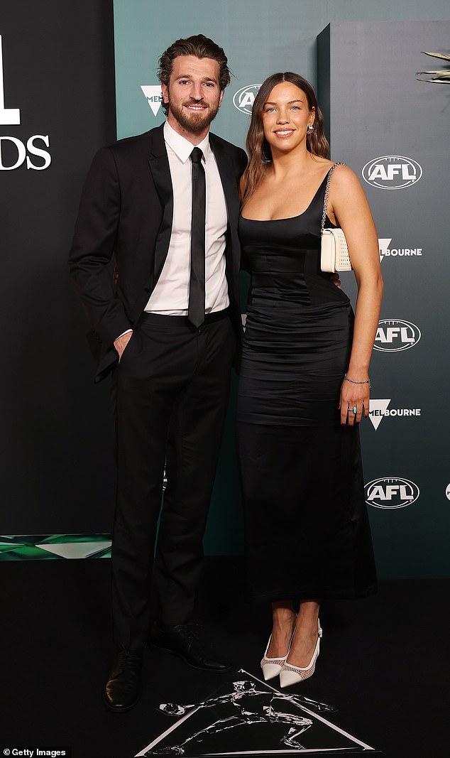 The 28-year-old, who arrived with his partner Neila Brenning (right), took home the Leigh Matthews Trophy as AFL Players Association MVP