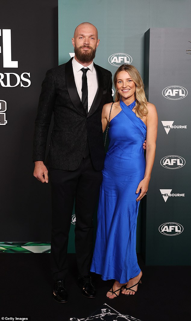 Max Gawn, 32, (left) of the Demons and his wife Jessica Todd (right) also made an appearance