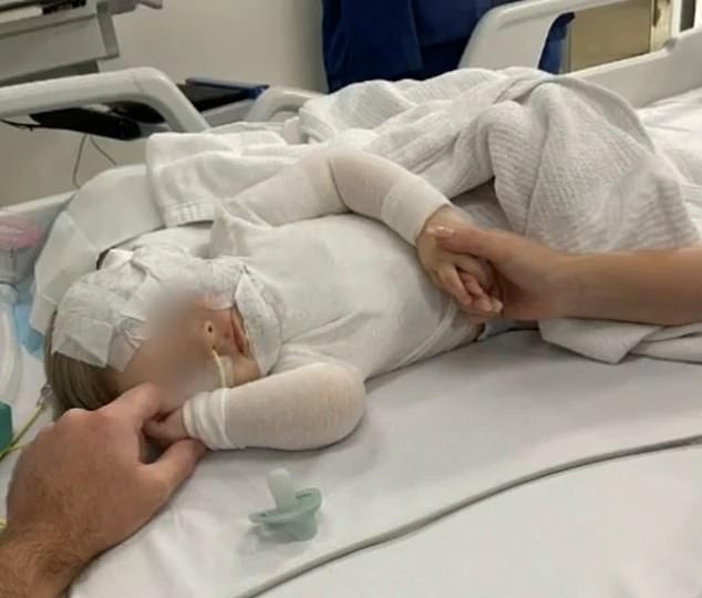 Luka (pictured) remains in Queensland Children's Hospital suffering from burns to 60 percent of his body