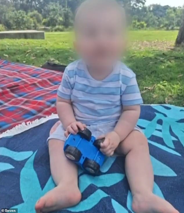 Luka (pictured in the park shortly before the attack) had taken his first steps just hours before he was burned by the unknown stranger