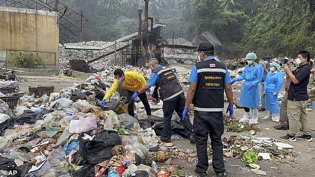 Thai forensic officers investigate a landfill site while searching for body parts of a Colombian surgeon on the island of Koh Phagnan. August 4, 2023