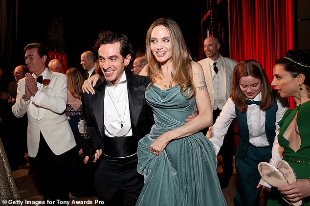 The publication has also claimed that the Maleficent star has been seeing another man, Broadway composer Justin Levine; pictured at this year's Tony Awards