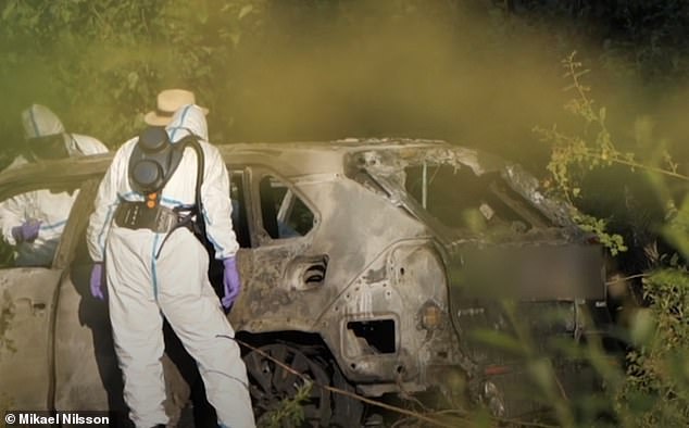 Forensic teams on scene after the discovery of the burnt-out car last month