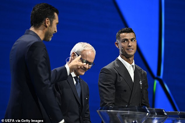 Cristiano Ronaldo (right) and Gianluigi Buffon (left) were involved in the draw for the league stage