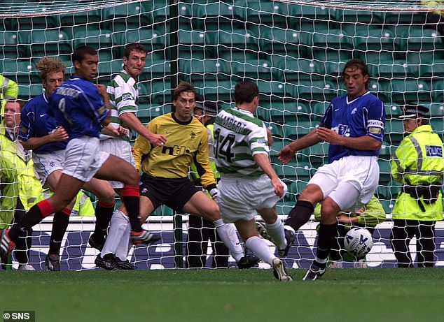 Paul Lambert scores Celtic's third goal, inside eleven minutes, in O'Neill's first derby