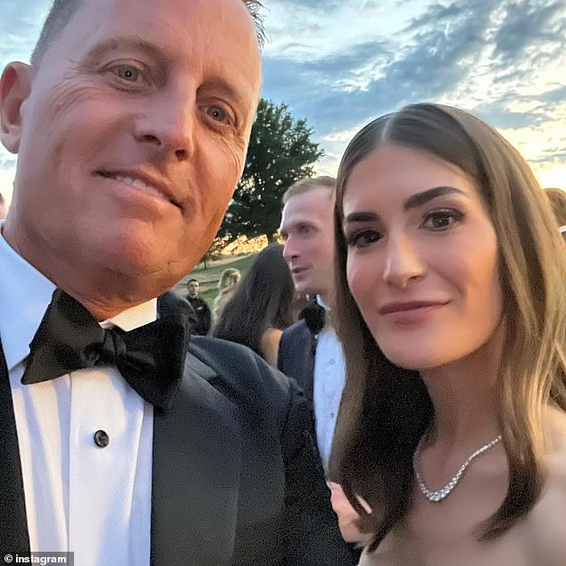 Grenell takes a selfie with bride Emily Moreno